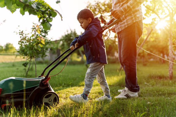 istock Boy helping granddad in the garden 1198305241