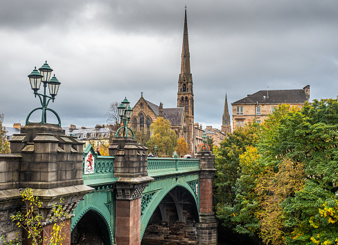 Kelvin Bridge and the Lansdowne Parish Church on Great Western Road, notable for its giant spire, one of the slimmest in Europe