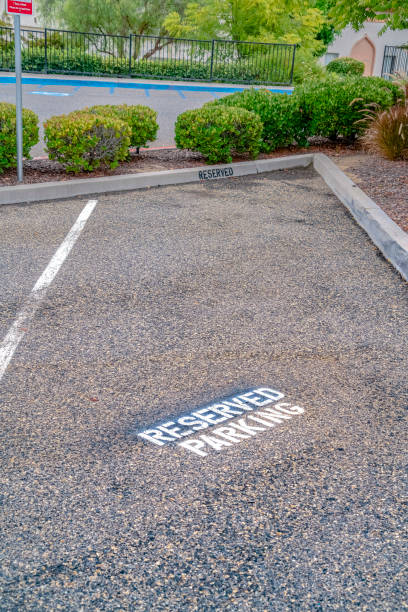 istock Reserved Parking sign on a restricted parking bay 1198305944