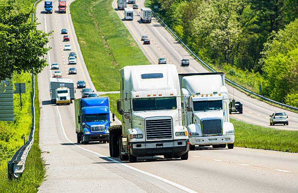 istock Trucks On A Busy Highway REWORKED 1198307327