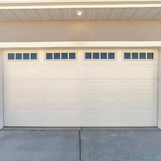 istock Square White automatic garage door for two cars 1198308401