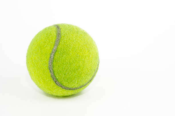 istock tennis ball and racket 1198308435