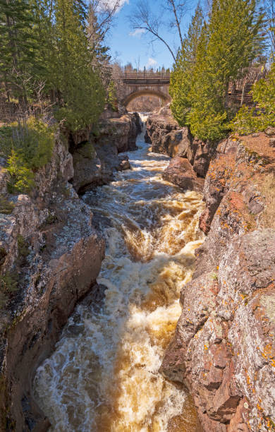istock Road Bridge over a Roaring River 1198309693