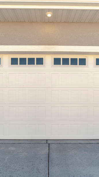 istock Vertical White automatic garage door for two cars 1198309744