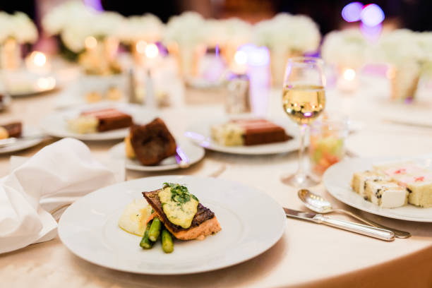 Wedding Dinner, Salmon and Asparagus Plate with Hollandaise Sauce with White Wine and Wedding Cake