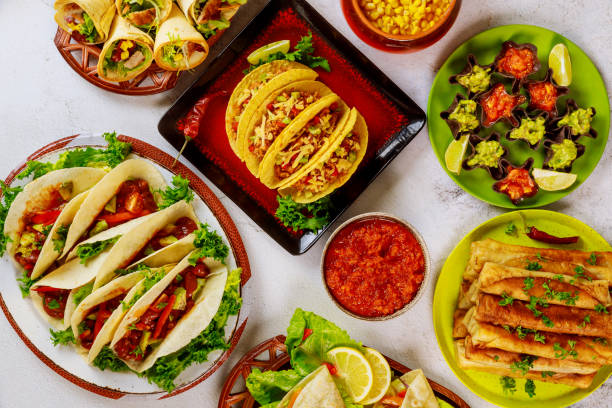 istock Colorful dishes from corn tortillas, taco shells. Mexican cuisine. 1198312035