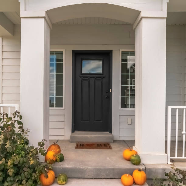 istock Square frame Pumpkins decorating a pathway to a house 1198312740