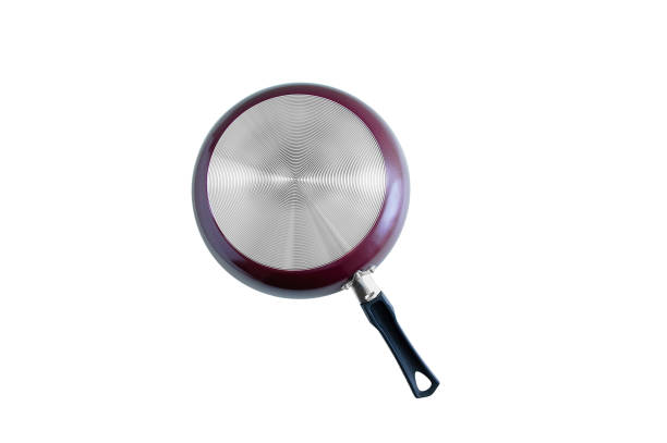 istock The bottom is a metal pan with a non-stick coating. White isolate. 1198315438