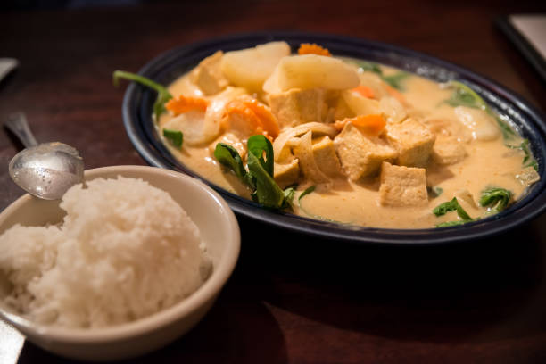Traditional thai tofu curry with coconut milk and vegetables