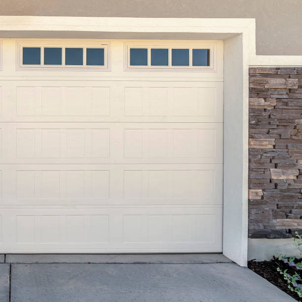 istock Square frame White automatic garage door for two cars 1198316336