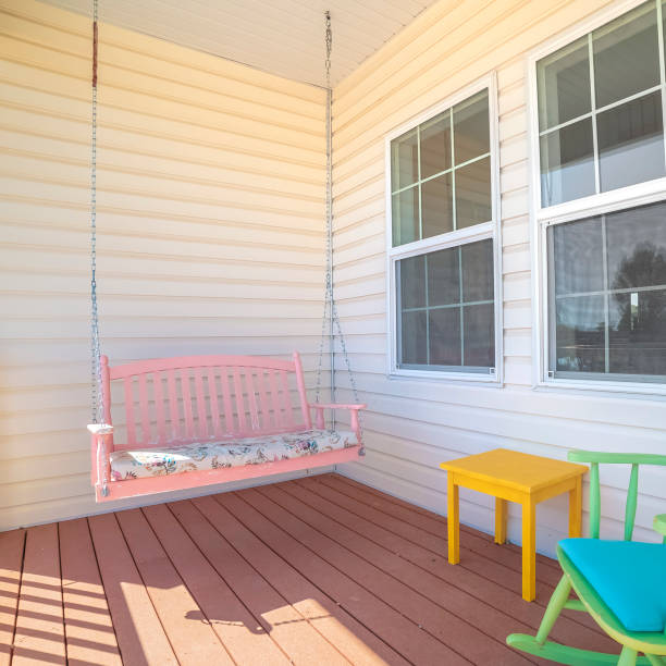 istock Square Colorful green rocking chair and pink bench 1198317403