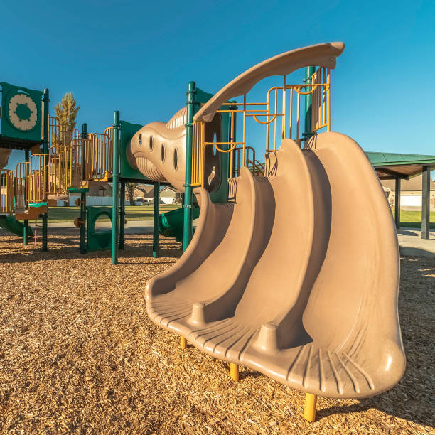 istock Square Unusual triple slide in a kids playground 1198317557