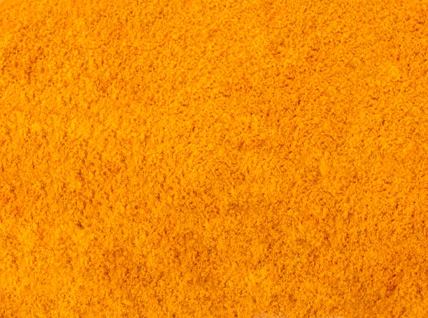 istock Turmeric (Curcuma) powder pile, top view 1198320762