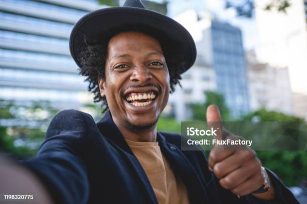 Camera Point Of View Of An African American Man Holding Thumbs Up Stock Photo - Download Image Now