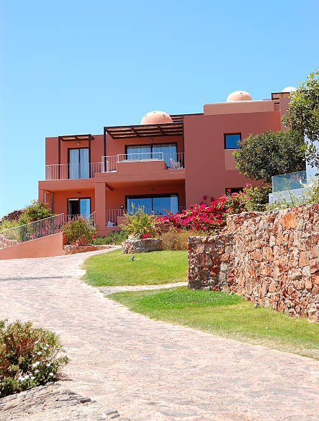 a white house by the sea