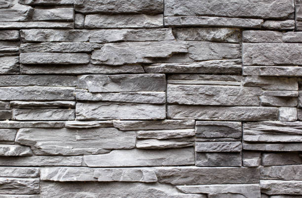 istock Texture and background of gray stone wall, modern building decoration, architecture 1198325795