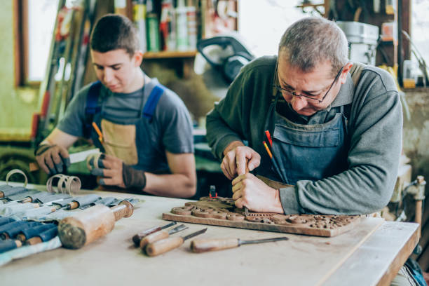 istock Father and son carpenters 1198325983
