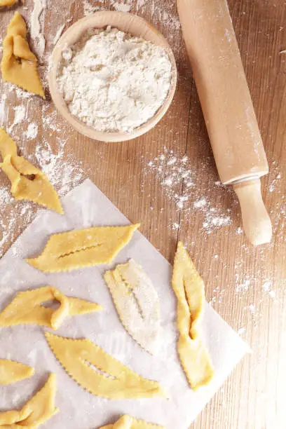traditional french bugnes for carnival- raw dough and ingredient