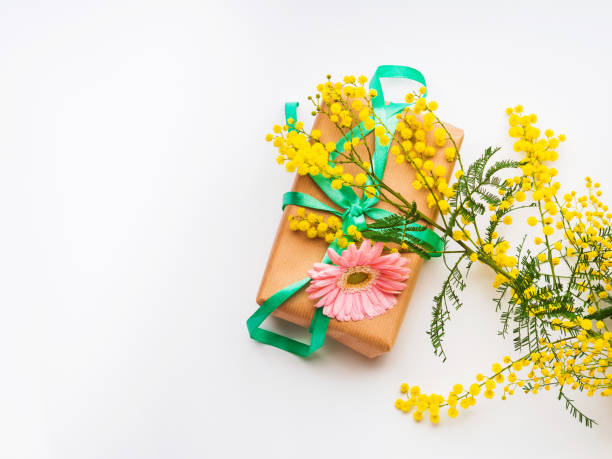 istock Womans day. Gift box with mimosa flowers 1198327758