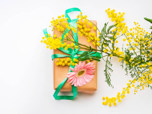 istock Womans day. Gift box with mimosa flowers 1198327764