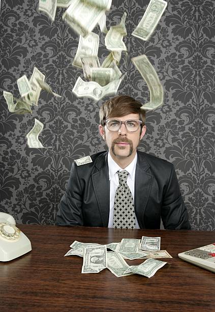 istock nerd businessman retro office flying dollar note 119832882