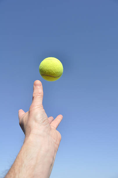 istock Serving a Tennis Ball 119833220