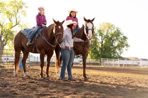 istock Horseback ridding training lessons with friends 1198335951