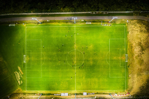 istock Football field. Night workout 1198338260