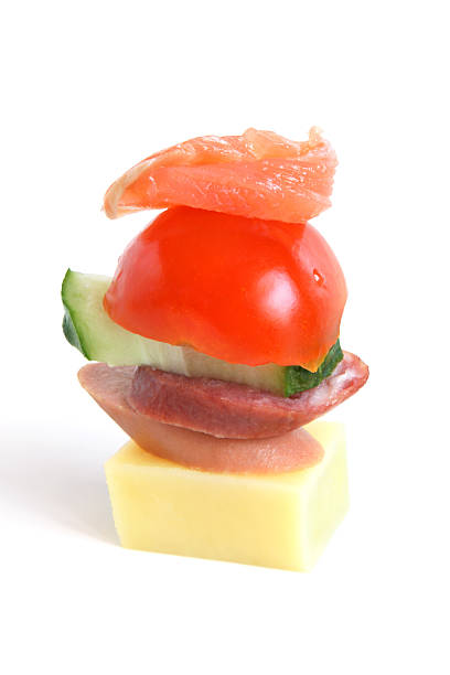istock Stack of vegetables, sausages, fish and cheese 119833981
