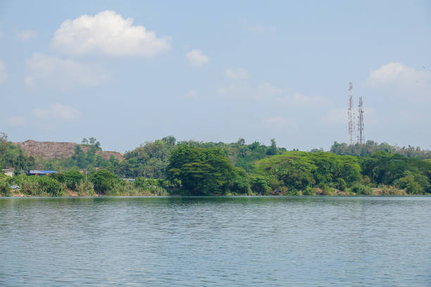 istock Scenic view of lakeshore during bright day. Selective focus. 1198344971