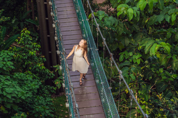 Young woman at the Suspension bridge in Kuala Lumpur, Malaysia Young woman at the Suspension bridge in Kuala Lumpur, Malaysia. 3381 stock pictures, royalty-free photos & images