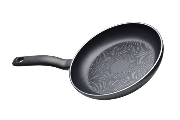 istock Black skillet with non-stick coated surface isolated 1198352465
