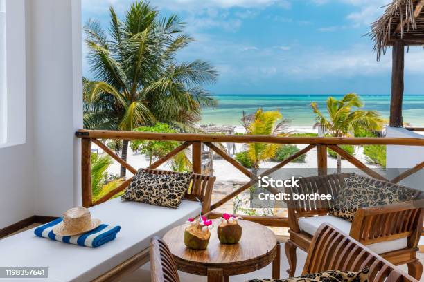 Beachfront Bungalow With Sea View Stock Photo - Download Image Now - Beach, Hotel, Tourist Resort