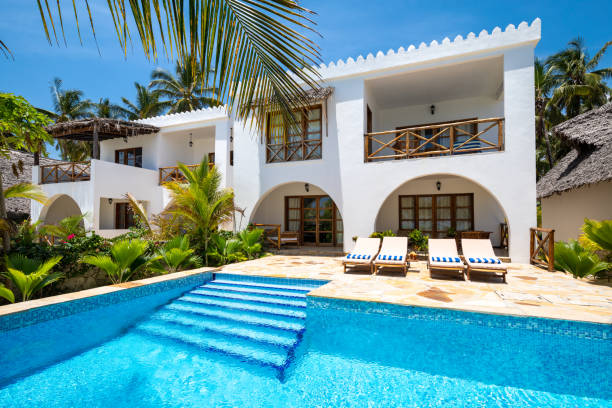 Luxury Apartment With Private Pool Luxury villa with swimming pool in Zanzibar, Tanzania. Property released. tropical beach house stock pictures, royalty-free photos & images