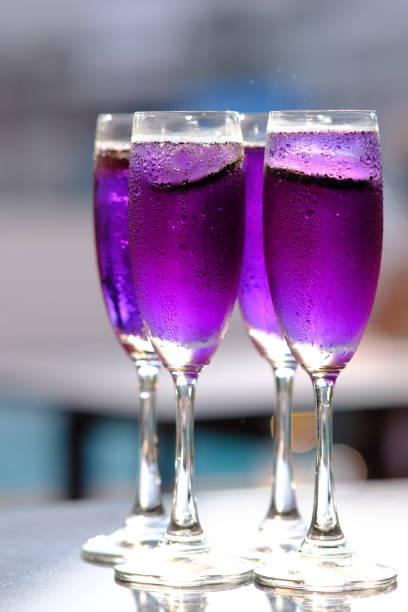 Butterfly pea cocktails on counter background