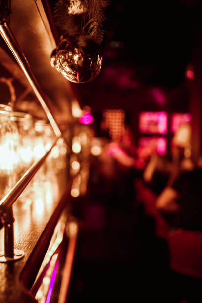 Central London, England, United Kingdom, GB. 19th December 2024. Ku Bar, a vibrant LGBTQ+ venue located at 30 Lisle Street, London WC2H 7BA. A street view captured in the evening during the Christmas holiday season in central London, UK.