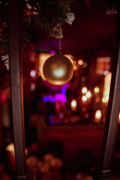 istock colored Christmas ball hanging on strings. festive background postcard for New Year,creative Christmas tree.Set Christmas baubles. Ideas for modern decoration, restaurant, hotel, winter wedding 1198361273