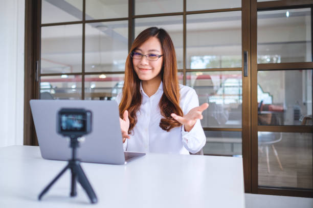 istock A woman blogger or vlogger recording a video 1198367126