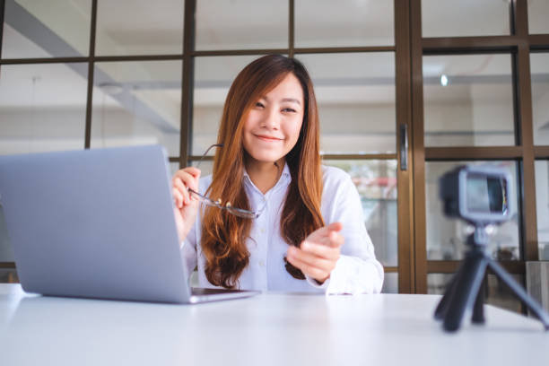 istock A woman blogger or vlogger recording a video 1198367144