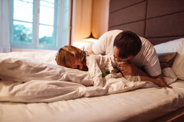 istock happy family in the bed 1198374462