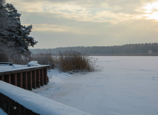 istock The river Lielupe river, snow-covered in Jurmala, Latvia 2018. 1198375514