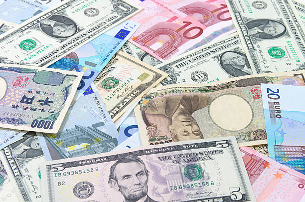 us-dollar, euro, yen - currency us paper currency five dollar bill usa stock-fotos und bilder