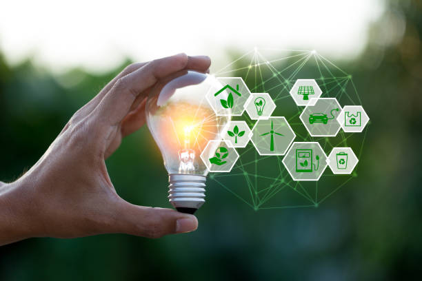 Hand holding light bulb with icons energy sources for renewable,love the world concept. Hand holding light bulb with icons energy sources for renewable,love the world concept. sustainable lifestyle stock pictures, royalty-free photos & images
