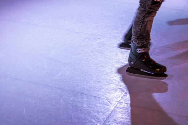 istock Ice skating on a synthetic ice rink 1198382812