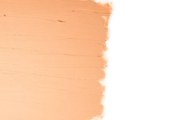 istock Liquid foundation texture. Make up for women. Top view. Isolated on white. Space for text or design. 1198387377