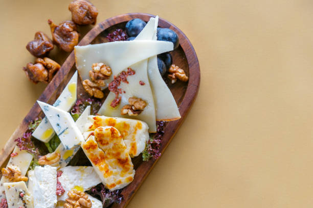 istock Plate of chees with nuts, grapes and figs 1198388729