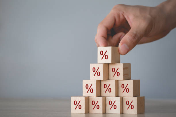 istock Hand arranging wood block stacking with icon percent symbol upward direction, 1198393484