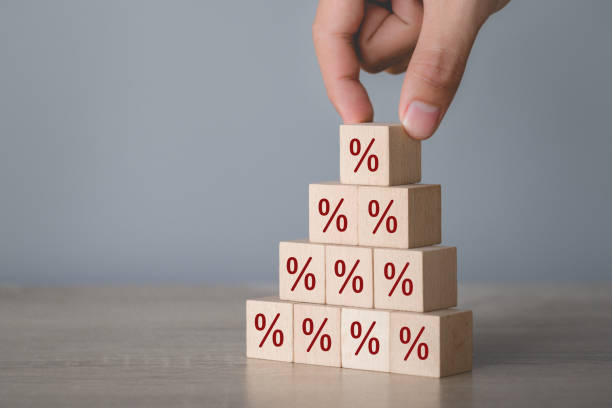 istock Hand arranging wood block stacking with icon percent symbol upward direction, 1198393569