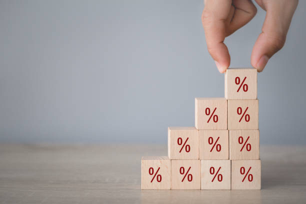 istock Hand arranging wood block stacking with icon percent symbol upward direction, 1198393632