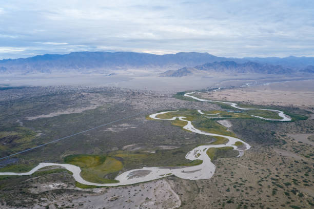 istock birds eye view of winding river on wilderness 1198394384